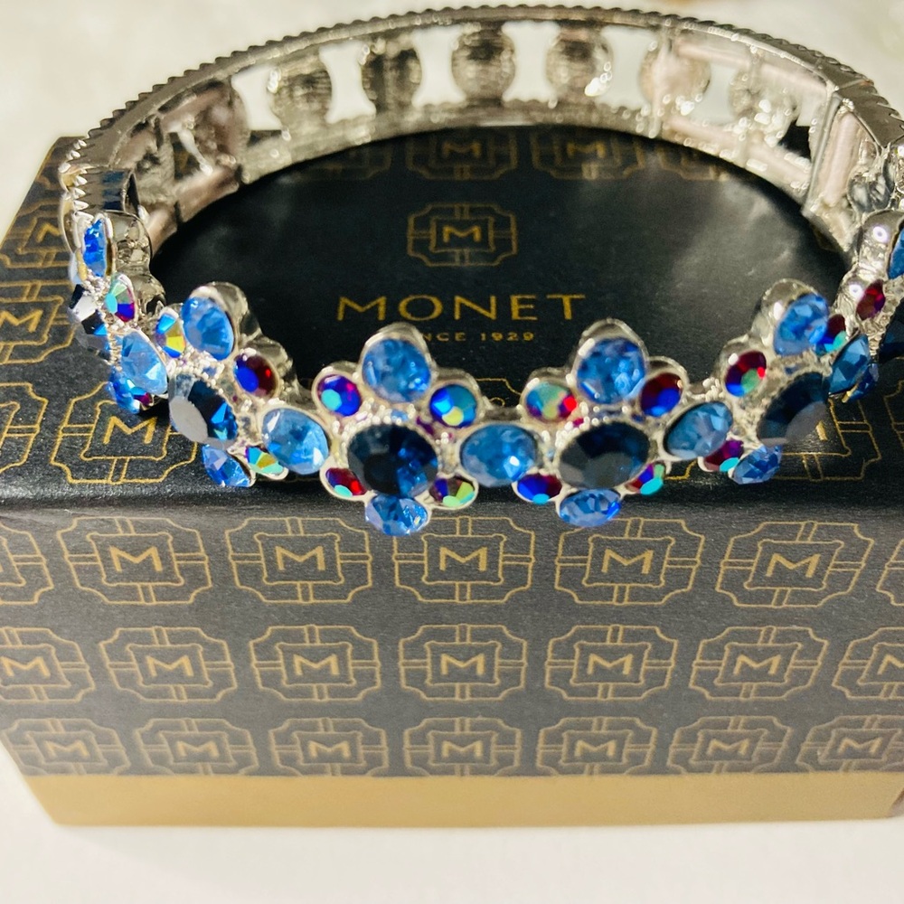 Monet Silver Bangle with Bright Blue Crystal Flowers